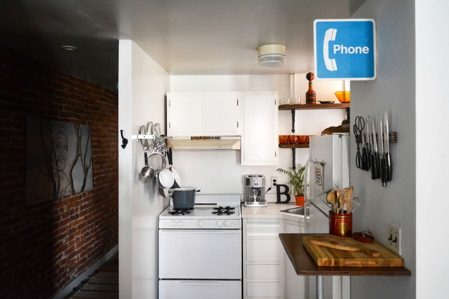 This WallMounted Pan Organizer Transformed My Tiny Kitchen The Kitchn